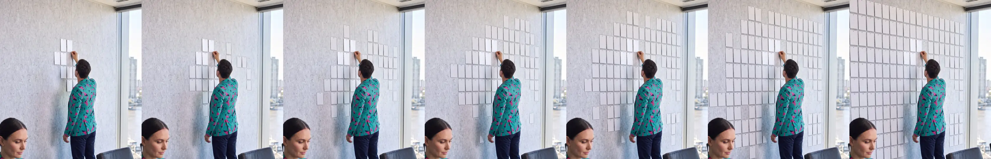 Seven nights in the same boardroom: each night Buddy (AI) pins up more cards until the wall is full, while an AI staffer works at the table.